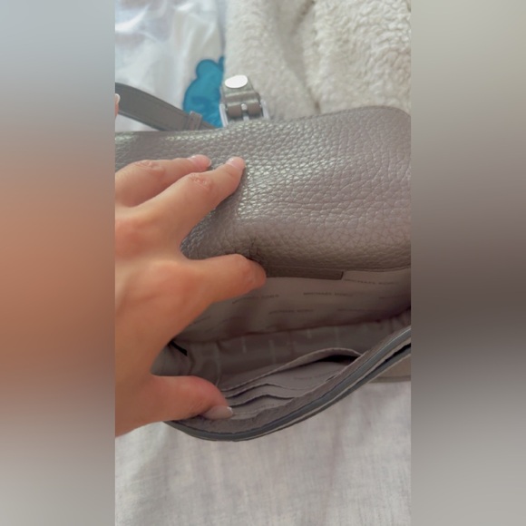 I’m selling a grey leather Michael kors cross body purse - Picture 2 of 7